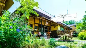 佐々木麻こ 作 「 公園のパン屋さん 」1996年 F4 油彩 KAKUMARUPAN AND STORE】国産小麦など食材にこだわる小さなパン屋